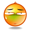 Two orange-yellow spherical icons with green lower faces, closed eyes, and small mouths; left icon has white pupils visible in open eyes while right shows only eye slits.