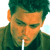 Animated contact sheet showing two frames of a pixelated Johnny Depp character with cigarette and CoolBuddy.com text on blue background.