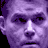 Purple-toned face with neutral expression appears in two positions against black background, surrounded by red text and graphic elements.