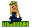 Pixel art of a blonde woman with green leaf crown holding dark blue object, standing above 'TAURUS' text on green background.