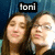 Two people pose together in a pixelated image with text overlays changing across frames.