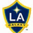 A pixelated shield-shaped icon with a blue center, yellow border, and white 'LA' text over a starry background.