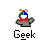Pixelated icon shows a figure with a red-and-white striped torso, gray arms, and a multicolored hat with orange cross on top, below the word 'Geek' in blocky text.