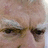 A static image divided into four quadrants showing a close-up of an elderly person's face with white hair and furrowed brows, alongside pixelated text reading "fierce" and "bart cummings."