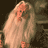 Static 48x48 pixel icon depicting a figure with long white hair and beard wearing light-colored robes, set against dark background.