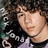 Pixelated image of a person with curly hair and purple clothing, surrounded by text phrases on black background.
