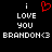 Pixelated text and symbols on black background: 'i' above red heart, 'LOVE YOU', 'BRANDON<3' in white block letters.