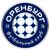 Circular blue and white icon with a central white circle containing six blue crosses arranged in a hexagonal pattern, surrounded by a blue ring with partially visible text.