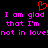 Red pixelated heart symbol above repeated pink text on black background reading "I am glad I am glad that I'm that I'm not in love!not in love!".