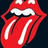 Red lips with white teeth and a red tongue extending forward, set against a dark background.