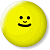 Static pixelated yellow circular icon with a simple smiling face, black eyes and mouth on a white background.