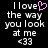 Pixelated text reads 'I love the way you look at me <33' with a pink heart replacing 'love', displayed on black background.