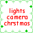 Pixelated red text reads 'lights camera christmas' on a white background with green clover border, four identical