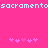 Pixelated cyan text 'sacramentosacramento' spans top of bright pink background with two of five light purple asterisks below
