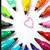 Colorful pencil radiating from center with pink heart outline, transitioning to grayscale version of same design.