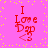 A pink background with yellow dots and red text reading "I Love Day" in a stylized font, with a small red arrow pointing left beneath the text.