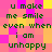 Green pixelated text on a pink and yellow checkered background repeats the phrase "u make me smile even when i am unhappy" in two