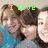 A four- shows three people in a group photo with green text overlay changing