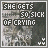 A static digital image displays repeated text "SHE GETS SO SICK OF CRYING" over a grayscale background with pixelated patterns and small heart symbols.