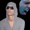 A person in a gray hooded sweatshirt and dark sunglasses appears with changing background elements across frames.