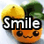 A pixelated image with four quadrants showing partial text and cartoon characters, including a smiling orange figure with a lemon and broccoli, and a green character with a tongue.