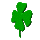 Green four-leaf clover icons in various pixelated orientations and sizes on a gray background.