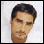 Static pixelated image of a man's face with dark hair and light skin against a white background.