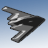 Pixelated gray stealth bomber icon with black accents against a light blue gradient background, rendered in low-resolution 256x256 pixels.