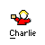 Pixel art character in red shirt holding yellow ticket, with text elements arranged around the figure on gray background.