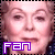 Two side-by-side pixelated images of a person's face with purple 'FAN' text below each, differing in eye and mouth details.