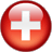 A static circular icon with a red gradient background and a white cross symbol at the center, rendered in pixelated style on a gray backdrop.