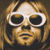 A 4x3 contact sheet of a pixelated animated icon featuring Kurt Cobain's face and the word "nirvana" in various distorted, glitchy text forms across sampled frames.