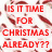 Four pixelated holiday-themed with text: red question about Christmas timing, green 'I like Christmas' over snowy landscape, black background tree with presents text, and empty gray