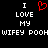 Black background with white pixelated text reading "I LOVE MY WIFEY POOH" and a red heart symbol replacing the 'O' in LOVE, repeated side-by-side.