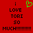 Red background with black pixelated text reading "i LOVE TORI SO MUCH!!!!!!!!!!" and a green heart symbol above the first 'i'.