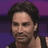 Pixelated image of a person with dark hair against purple background, split into four quadrants with red and gray sections containing text.