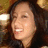 A pixelated image shows a person with dark hair and light skin smiling, next to blue text reading 'aileen' on a white background.