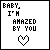 25 identical pixel art icons with text 'BABY, I'M AMAZED BY YOU' and a heart symbol that changes color from black to pink across frames