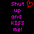 Pixelated text 'Shut up and KISS me!' in bright pink on black background with red heart symbol above first line.