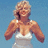 Pixelated image of a person with light hair wearing a white sleeveless top against a blue background.