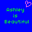 Blue background with green pixelated text reading 'Ashley is Beautiful' and a pink heart symbol above the left side of the text.
