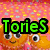 Pixelated image with four distinct sections: top-left shows orange characters with green text 'Tories', top-right has pink 'Is' and green turtle-like figure, bottom-left displays blue text 'Zandomly Awesome' on pink starry background.