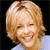 Static pixelated image of a person with light brown hair and a blue top against black background, likely a celebrity or public figure icon.