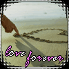 A beach scene with a hand drawing an infinity symbol in sand, overlaid with 'love forever' text in pink and white script.