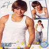 A person in a white tank top with yellow stars, two smaller inset images of the same person, and blue text at the bottom.