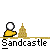 Pixel art animation of a yellow-shirted figure with white head interacting with sandcastles and green bushes on gray background, text "Sandcastle" below.
