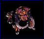 Animated creature with metallic brown and purple body, pink eyes, curved horns, and segmented limbs against black background.