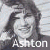 A grayscale animated sequence shows a person with shoulder-length hair smiling, with the name 'Ashton' displayed below in white text on dark gray bars.