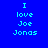 Four blue display pixelated text reading "I love Joe Jonas" in varying shades of cyan and blue