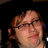 Pixelated image of a person with glasses and brown hair on left, pink background text reading 'the funniest face EVER made!!!!' top right, 'PATRICK STUMP!!!' bottom left.
